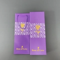 Purple gift box and matching bag with golden rose patterns and Rose of Love text - Purple Box + Handbag