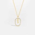 Detailed close-up of 18K gold S-letter necklace pendant with sparkling zircon accents - Letter S