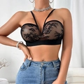 Detail eines schwarzen Spitzen-Bandeau-BHs mit Blumenmuster und V-förmigen Trägern - S / Schwarz