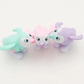 Trois pingouins mécaniques colorés en vert menthe, rose et couleurs lavande - Manchot