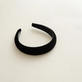Detailed view of the thick matte velvet padded headband in classic black fashion - Black