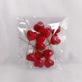 Detail of glossy red foam hearts with long green stems for DIY floral crafts and cakes - 25mm (Pack)
