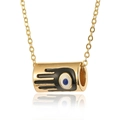Macro shot of gold cylinder necklace pendant with black Hamsa and evil eye drop oil detail - Gold-Hamsa Hand/Evil Eye