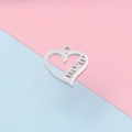 Heart-shaped stainless steel MOM pendant for Mother's Day on pink and blue background - MOM Hollow Heart (MP602)