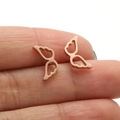 Elegant rose gold hollow angel wing stud earrings made of polished stainless steel - 672 Angel Wings / Rose Gold