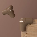 Paraspigoli in silicone a forma di dinosauro marrone per la sicurezza dei bambini in casa - Angolo Dinosauro Corto Caffè