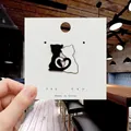 Cute black and white enamel cat pins forming a heart shape on a display card - 99*Couple Cats Heart Pin