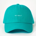 Adjustable teal cotton baseball cap with white Not Really embroidered text on front - Adjustable / Dark Lake Green