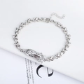 Adjustable silver floral link bracelet featuring a classic Virgin Mary religious pendant - Silver Virgin Mary Flower