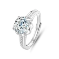 Macro view of four-prong silver ring with a large clear center stone and paved side gems - FDJZ-050-Moissanite (D Color)