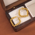 Orecchini a cerchio con perline dorate in acciaio inossidabile in scatola regalo in legno - Oro