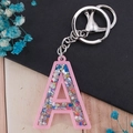 Portachiavi lettera A in acrilico rosa con paillettes colorate e anello argento - Lettera A