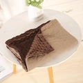 Close-up of a double-sided baby blanket featuring soft Minky dots and muslin cotton texture - 100X70 / Dark Coffee
