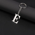 Silver stainless steel keychain featuring a polished capital letter E on leather - Letter E
