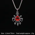 Collana teschio gotico con pendente occhio rosso su catena in acciaio da 70cm - Mano di Teschio Malocchio Rosso