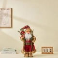 Bambola Babbo Natale a quadri rossi con sacco di regali e finiture in pelliccia sintetica - 45cm