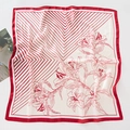 Detail of red floral print and geometric stripes on a square silk scarf accessory - Striped Lily - Wine Red