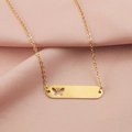 Detailed macro view of a gold bar pendant featuring a delicate hollow butterfly cutout design - Hollow Butterfly Style (MP387-4) / Gold