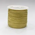 Cordón de nailon verde dorado de 0,8 mm para joyería en carrete de plástico blanco - Color 735 Verde Hierba