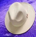 Beige wide brim felt jazz hat with decorative ribbon and logo on purple silk background - Off White