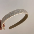 Close-up of beige headband featuring sparkling sequins and glitter for a dreamy hair accessory - Apricot