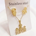 Detail of gold stainless steel family set with silhouette pendants on a display card - Set 2711 Gold Family