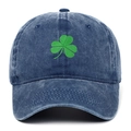 Close-up of green shamrock embroidery on dark blue washed denim baseball cap - Adjustable / Navy Blue