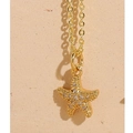 Collana chic con ciondolo a stella marina dorata e zirconi brillanti incastonati - Stella Marina Cicciotta (XL2422) / Oro