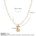 Elegant gold pearl necklace featuring letter E pendant with stainless steel chain - Letter E (XL185 Artificial Pearl E Gold-Tone Necklace)