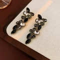 Vintage gold metal earrings with black and grey rhinestones on a wooden tray - 75# Vintage Metal Black Zirconia Earrings (Silver Earring Post)