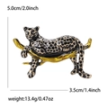 Detailed view of enamel leopard brooch with dimensions 3.5cm by 5.0cm and weight 13.4g - Black