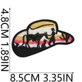 Detailed embroidery texture of western cowboy patch with dimension marks 8.5x4.8cm - US 3