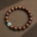 Brown Phoebe zhennan wood prayer beads bracelet with light green jade accent - Golden Sandalwood 10mm With Jade