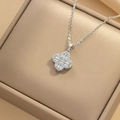 Sparkling silver four-leaf clover pendant necklace with clear crystals on beige box - 8920 Steel Color T Zirconia Four-leaf Clover