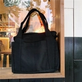 Minimalistische schwarze Canvas-Einkaufstasche mit zwei großen Fronttaschen - Schwarz
