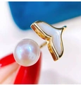 Minimalist ring featuring a round white pearl and a golden fish tail design charm - Adjustable Open / White