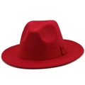 Detail of red fedora hat featuring a matching satin ribbon and wool felt texture - Red