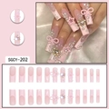 Pink press-on nails with pearls, bow accents, and heart rhinestones in a SGCY-202 set - SGCY-202 Pink Pearl Bow Heart Rhinestone Style