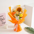 Handmade knitted sunflower and tulip bouquet in orange paper wrap for gift - Team Building Bouquet