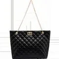 Elegant black quilted tote bag featuring a gold chain strap and metallic twist lock clasp - Black