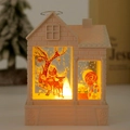 Detail of warm glowing house lamp featuring Santa and reindeer motifs in a holiday setting - Elk / Beige