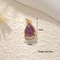 18K gold plated teardrop amethyst pendant with zircon accents on a textured background - Purple Crystal Water Drop