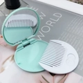 Portable mint green chocolate biscuit style folding mirror and comb set for travel - Light Lake Blue