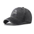 Washed black cotton baseball cap featuring red cherry embroidery from a 45-degree angle view - Adjustable / Cherry Black