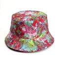 Close-up of tropical floral print bucket hat with pink flowers and green leaves - Light Blue Background Pink Floral Tropical Leaf (Style H)