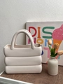 Creamy white EVA mini handbag featuring unique 3-layer wave texture and sleek handles - Off White