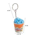 Creative orange popcorn bucket keychain with blue popcorn kernels and metal ring - Blue