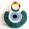 Handcrafted dark green knitted shell bag with evil eye pattern and resin ring handle - Green with Tassel