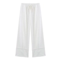 Detail of white wide-leg linen trousers featuring an adjustable drawstring waistband - XS / White Pants