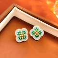 Close-up of flower-shaped earrings with pearls and crystals in a brown jewelry box - Blue Green Gold Pearl Flower Studs (15#)